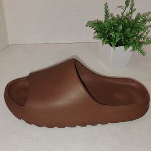 Yeezy Slides. Brown in Color. Men's size 10.
